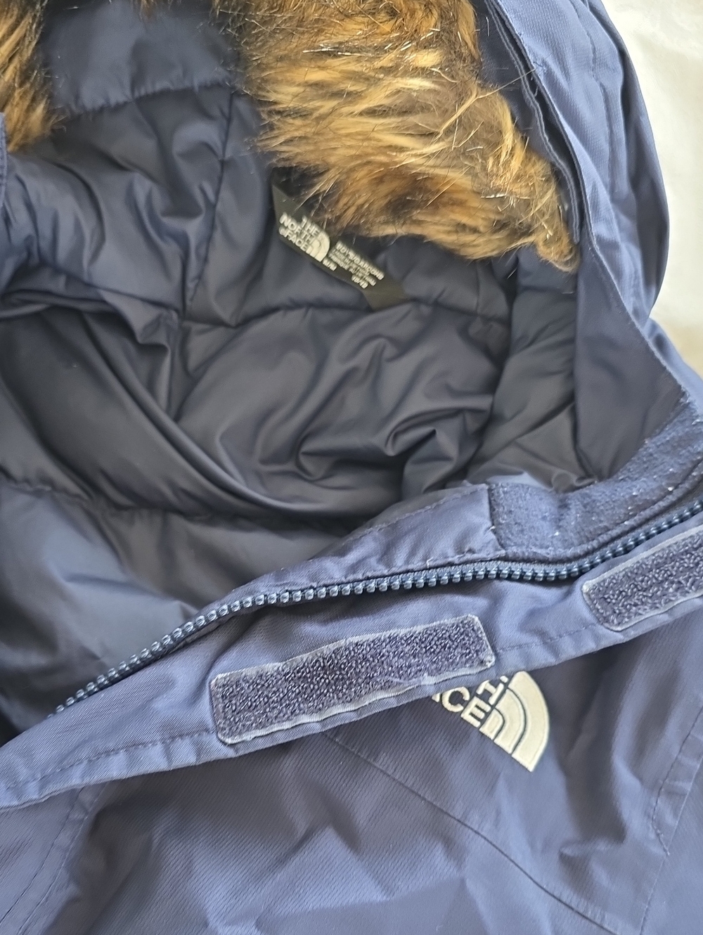 The North Face Navy Blue Kids Puffer Jacket with Faux-Fur Hood Trim
